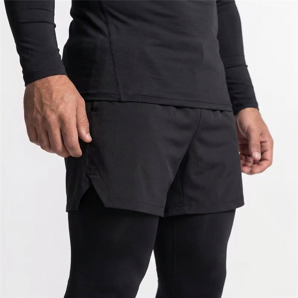 Athletic gym shorts with ergonomic side slit for mobility — Black